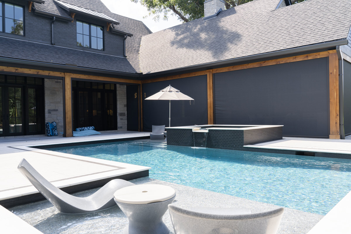 Modern pool and spa with loungers